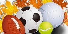 picture  of fall leaves and a football, soccerball, volleyball,tennis ball