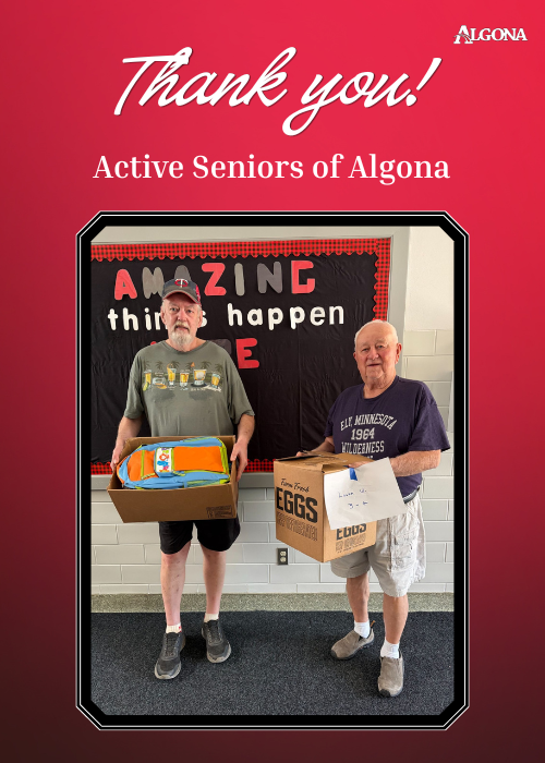Two men in shorts and sneakers hold boxes. One holds a box of toys; the other holds a box with the word "EGGS."