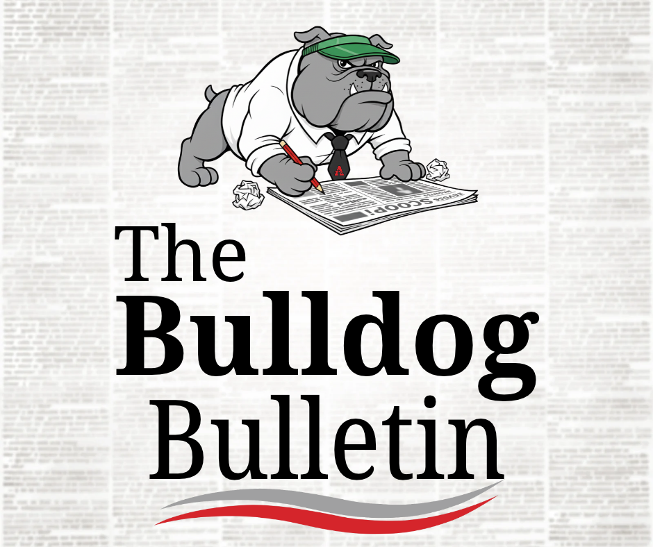 A cartoon bulldog with a green hat, writing on a newspaper. Text reads "The Bulldog Bulletin". Background is a newspaper.