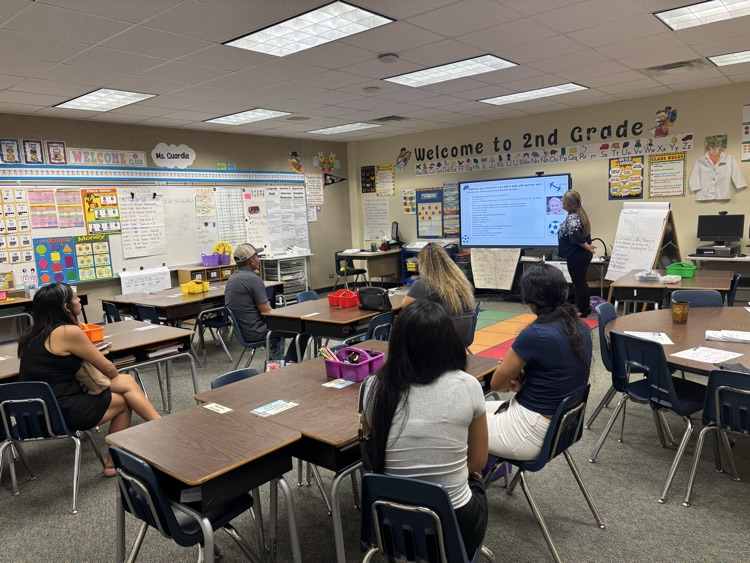 teachers presenting during open house 