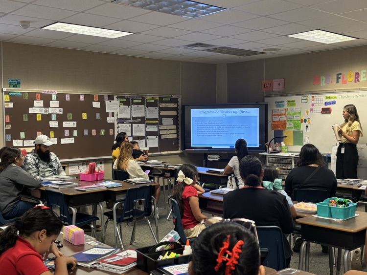 teachers presenting during open house 