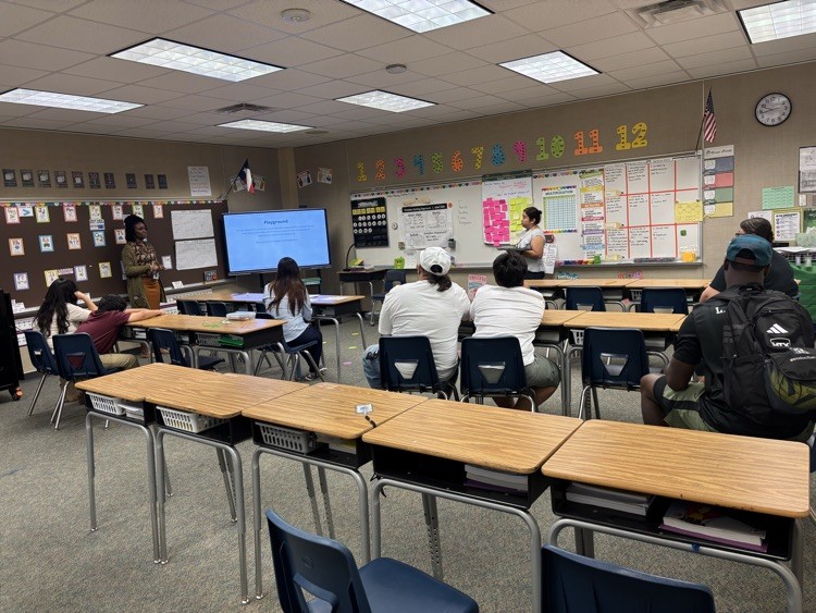 teachers presenting during open house 
