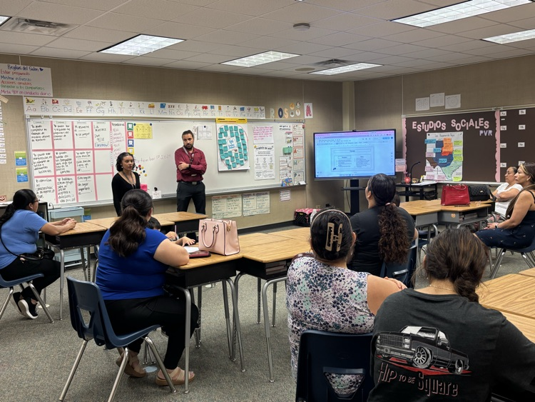 teachers presenting during open house 