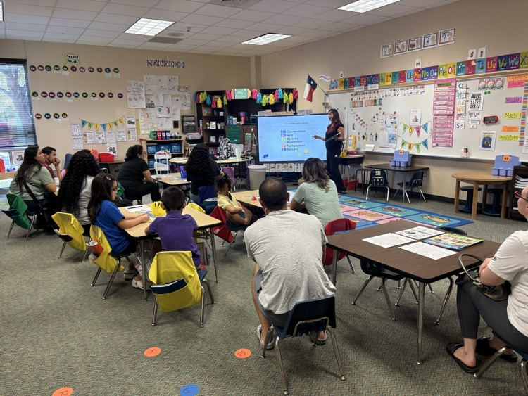 teachers presenting during open house 