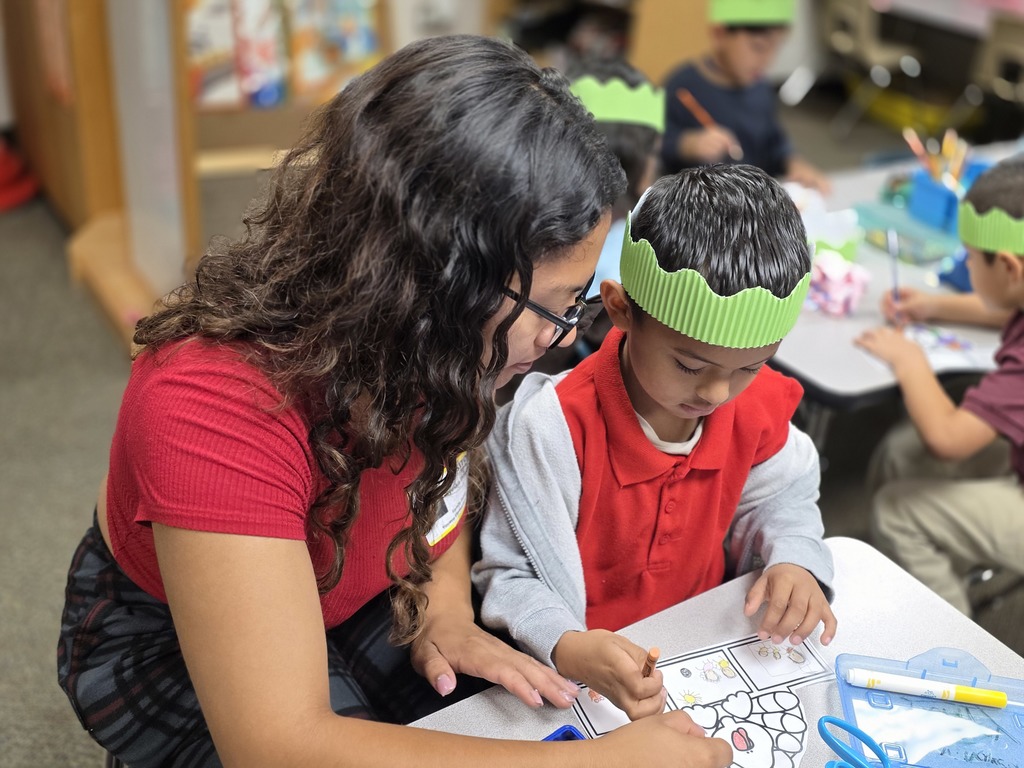 Parent with child during youens huddle