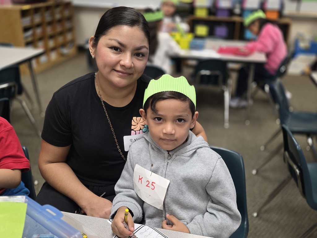 Youens Huddle event parent working with their child