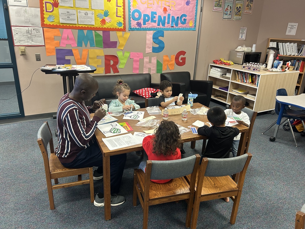 kids working on assignment at a table