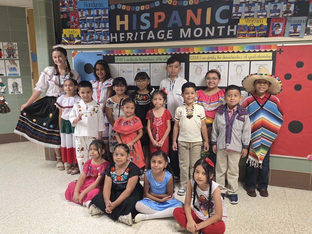 Students and teachers dressed in Hispanic attire