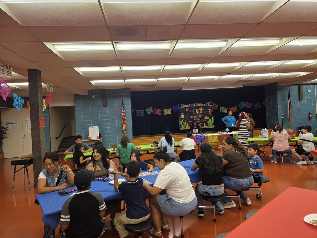 Families joining us in the cafeteria for Loteria Night!