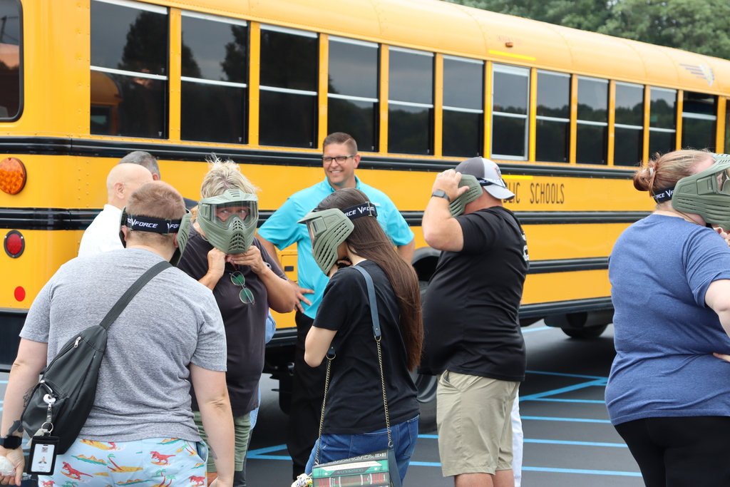 A group of drivers prepare for training to begin