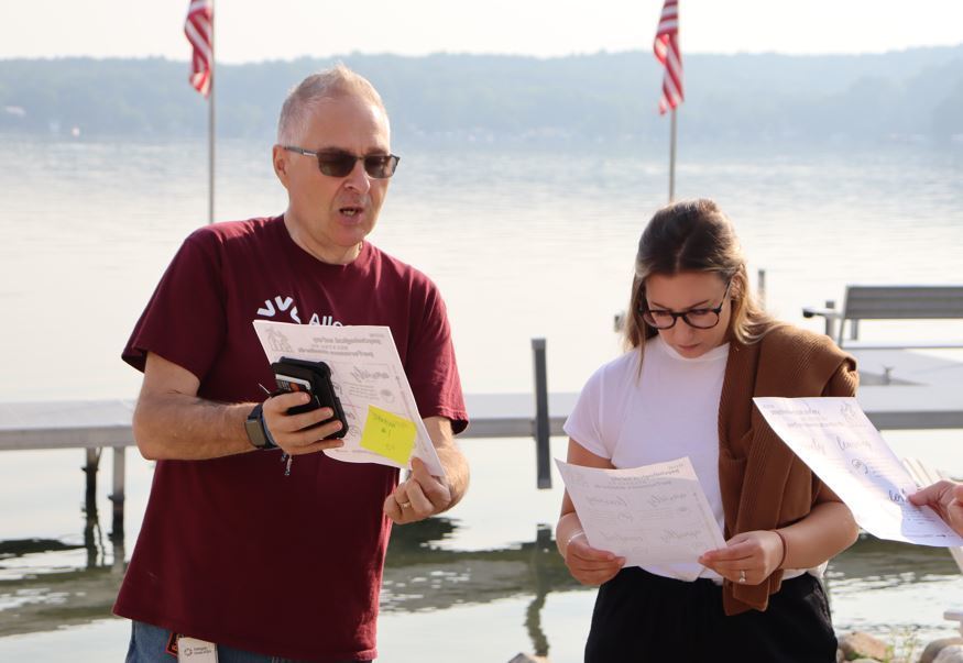 two leaders reviewing document