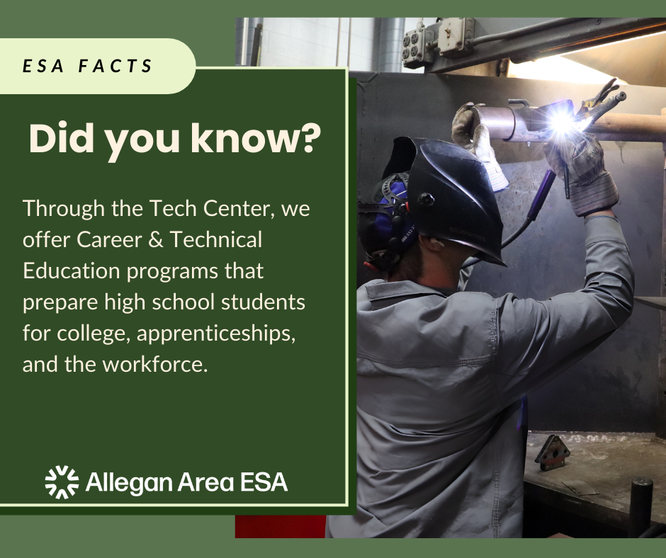 student wearing protective mask and welding metal