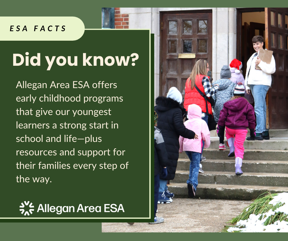 group of children walking up steps greeted by director holding clipboard