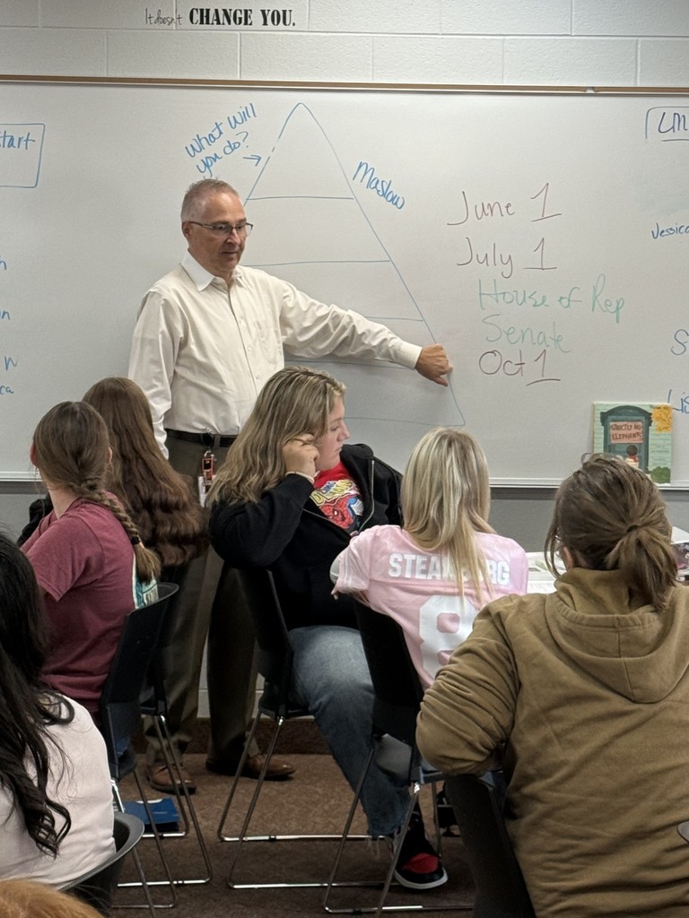 Superintendent William Brown speaks to classroom of students