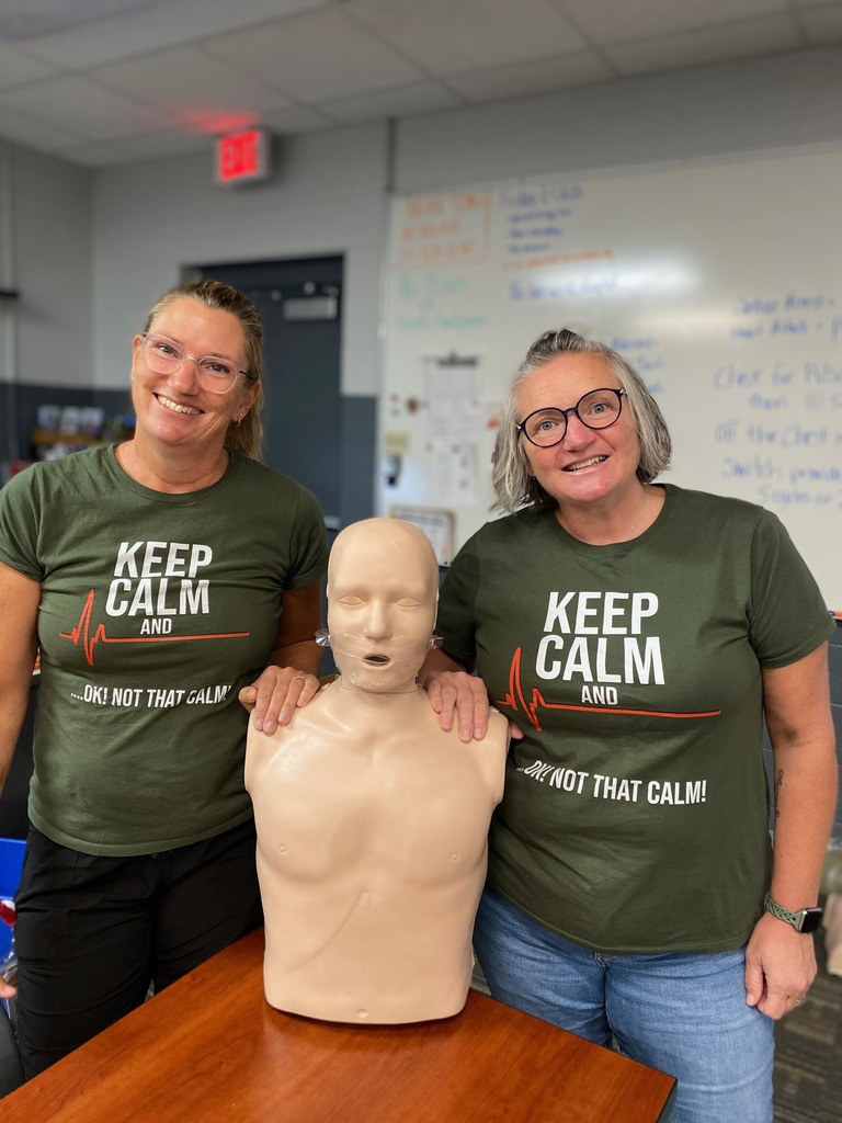 EMS Instructors  and a CPR mannequin. What a team!