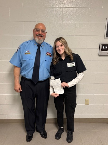 student with ems professional