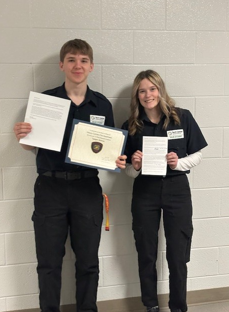 2 students with certificates