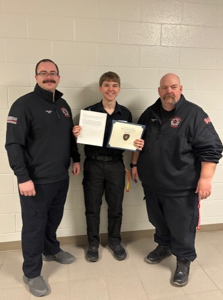 student with 2 ems professionals