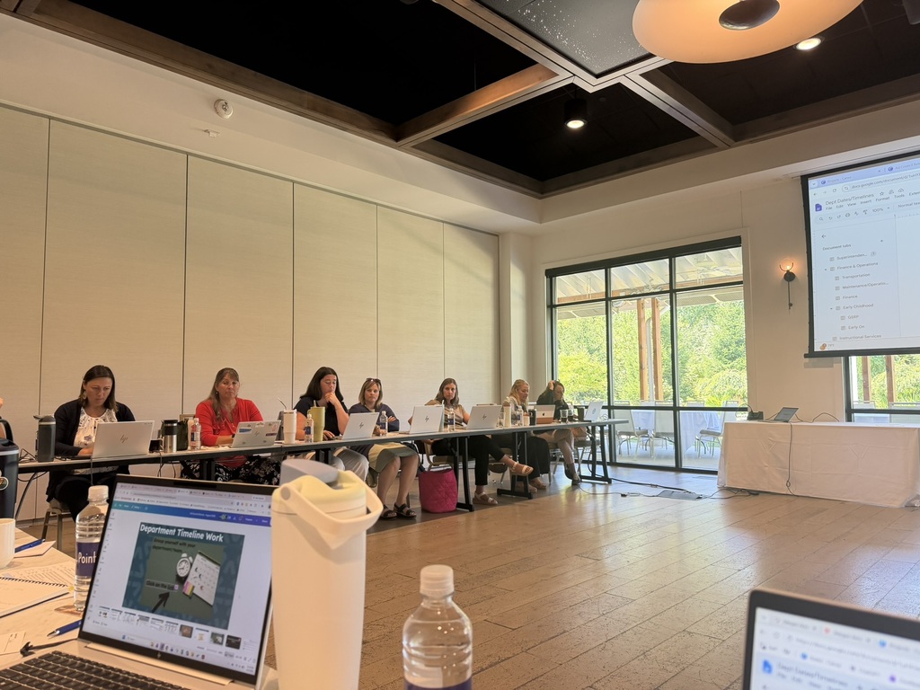 ad council member work on their computers during the annual ad council retreat. 