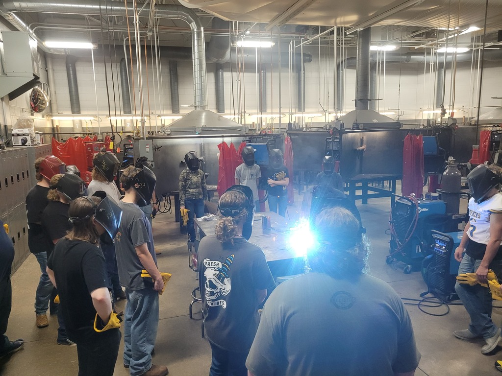 welding students in the shop