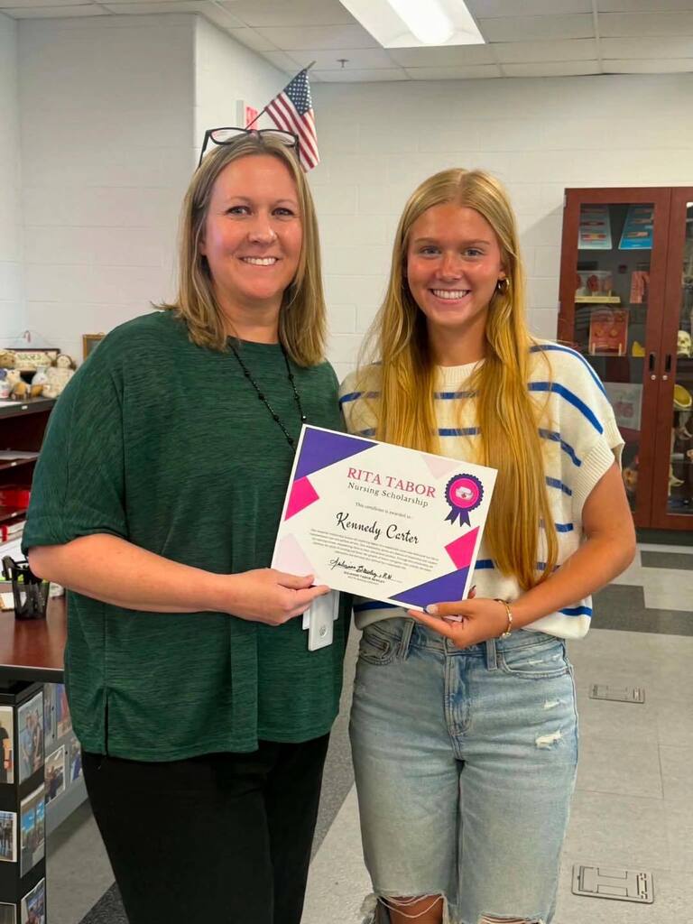 Student accepting scolarship