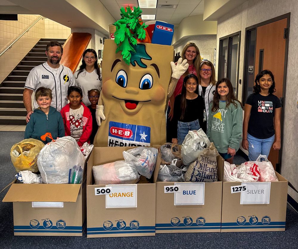 Cheatham Elementary shows off bags for H.E.B. drive
