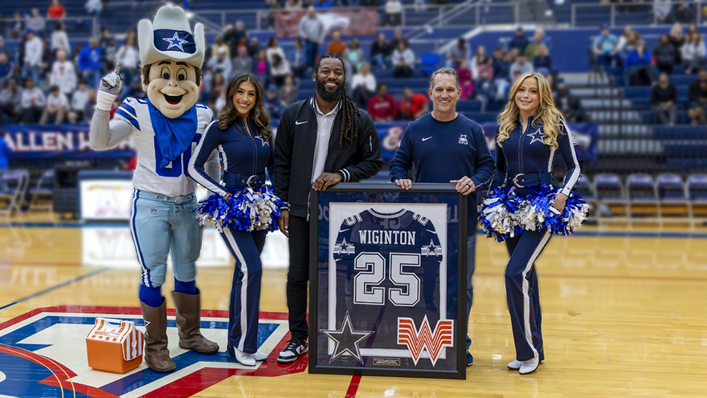 Coach Lee Wiginton with representatives from the Dallas Cowboys