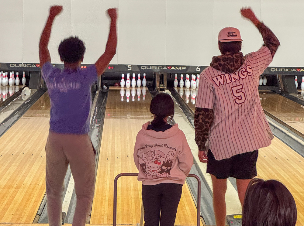 Students cheer at Special Olympics Bowling