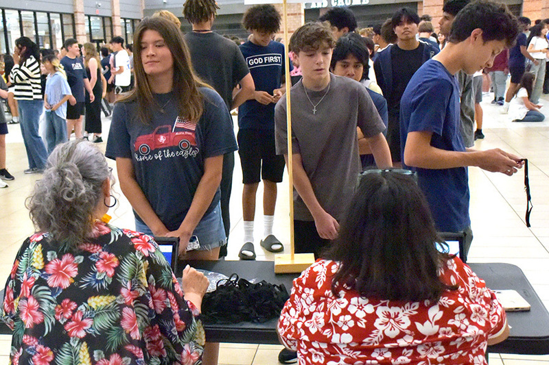 AHS students pick up IDs