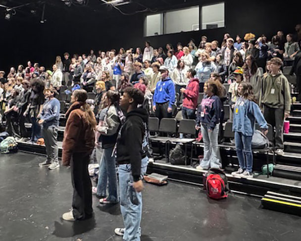 Students work on Play in a Day production