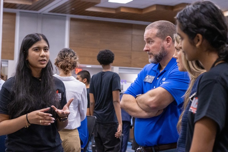 AHS students with instructor at NASA HUNCH event