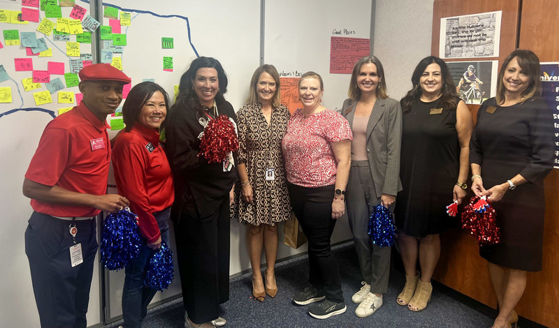 Daleena Nash in group photo with trustees and administrators