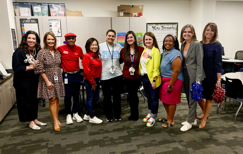 Group photo with Courtney Dumois and Ereen Fahmi with Trustees and administrators