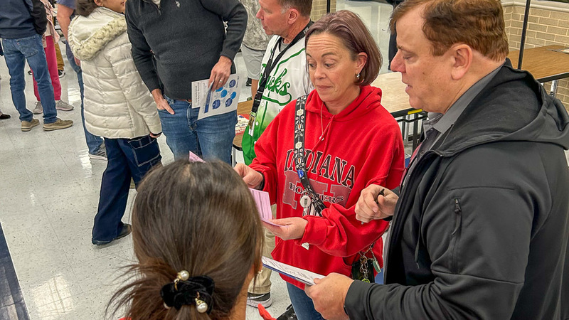 Family discussion at Middle School Expo Night