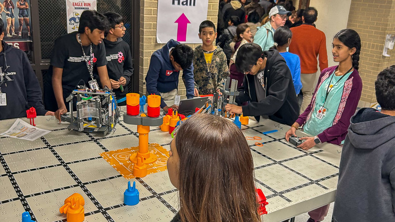 Students try robotics at Curtis Middle School Expo Night