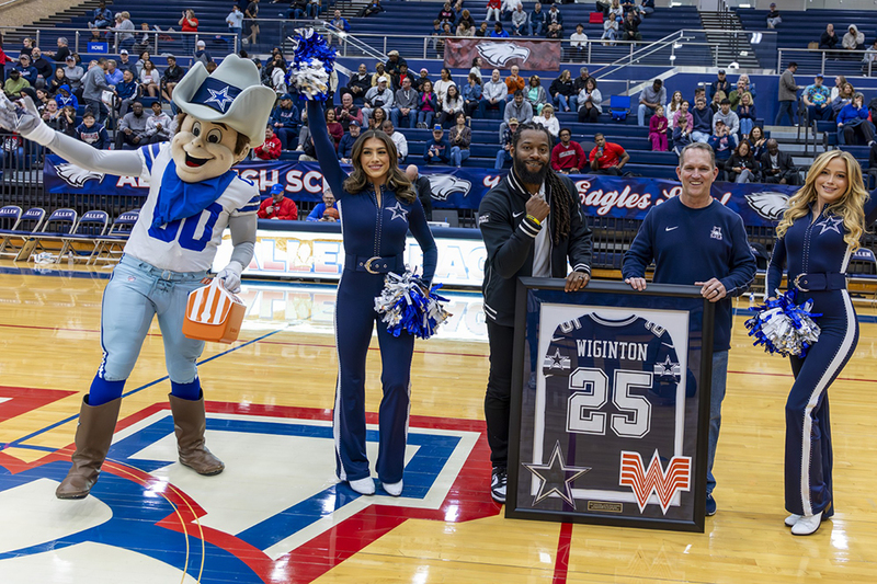 Coach Lee Wiginton with representatives from the Dallas Cowboys