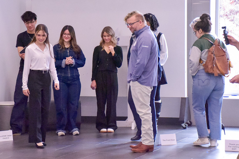 AHS students go over Easter Bunny photo booth walkthrough