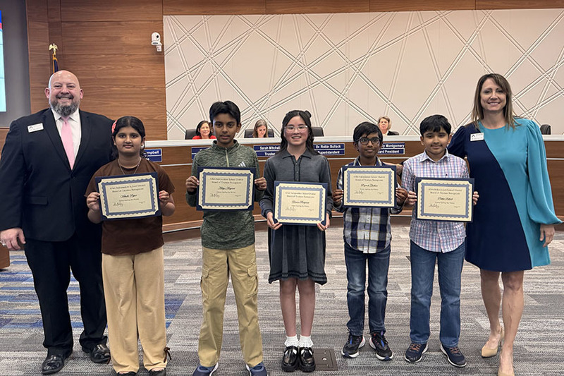 Allen ISD spelling bee winners with Trustee Dr. Bill Parker and Superintendent Dr. Robin Bullock
