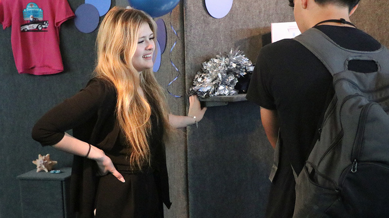 IB student at Theory of Knowledge exhibit