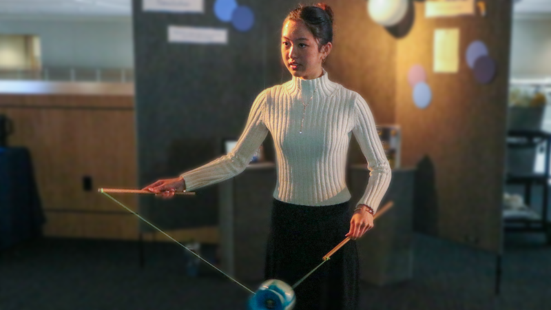 IB student at Theory of Knowledge exhibit