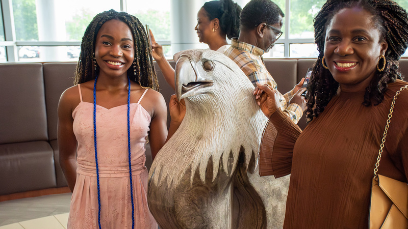 Associates Degree ceremony mom and student