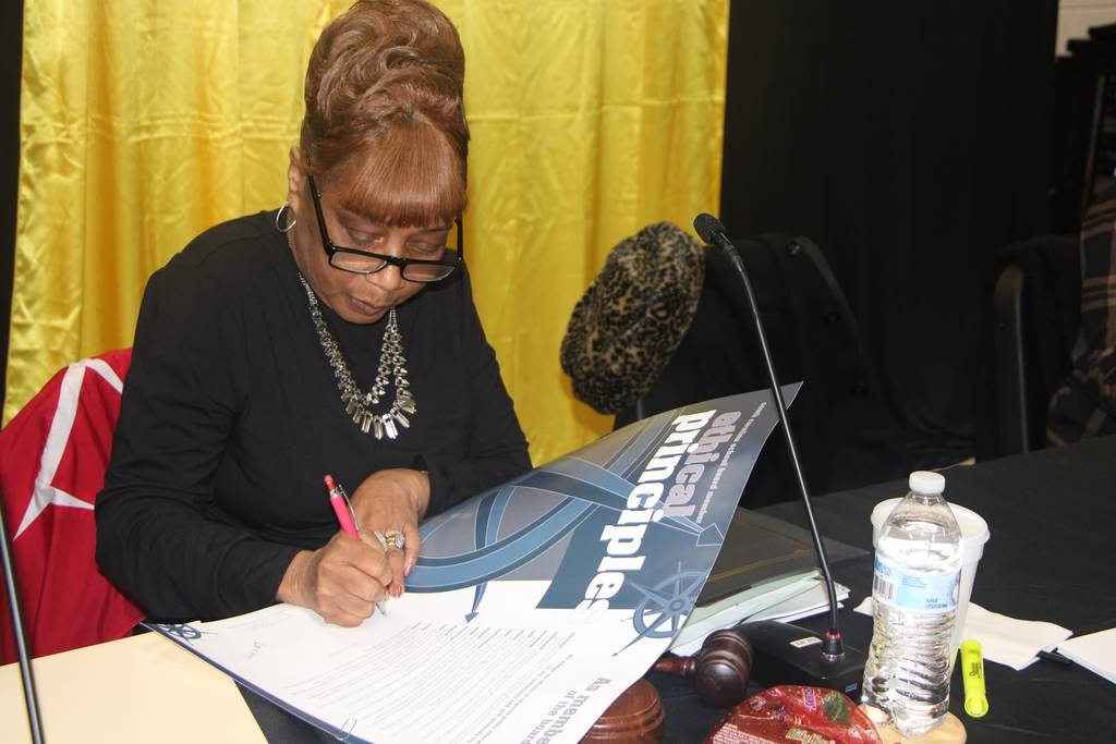 board member signing