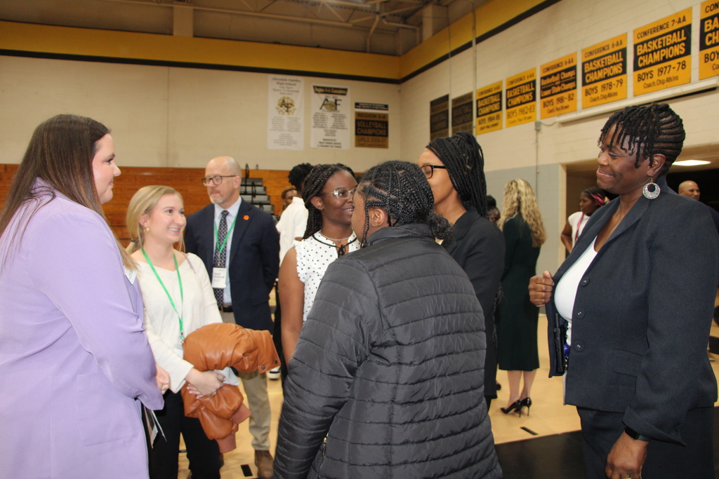 students speaking with clemson representatives