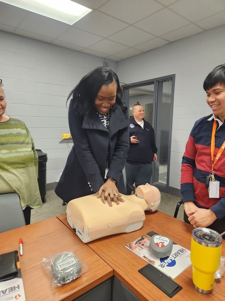 teacher practicing cpr