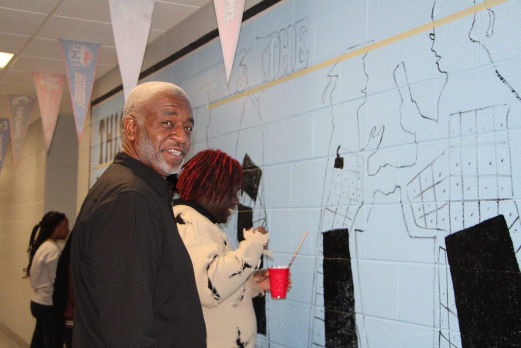 children painting murals