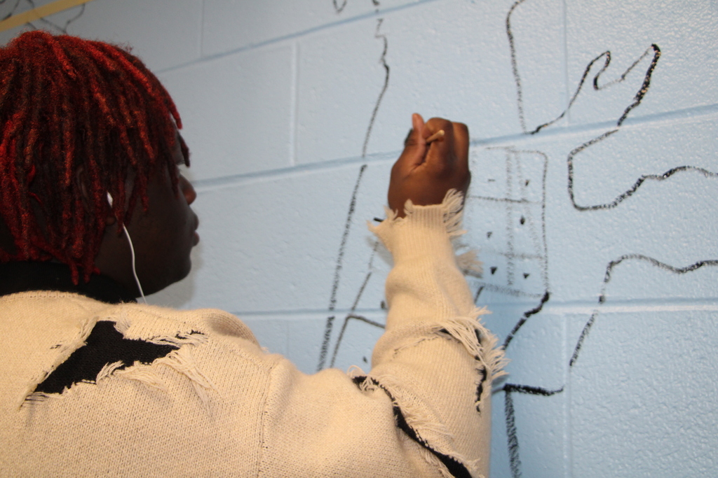 children painting murals