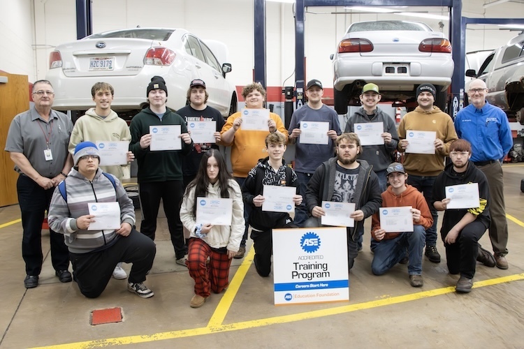 group picture of the auto tech students holding their certificates