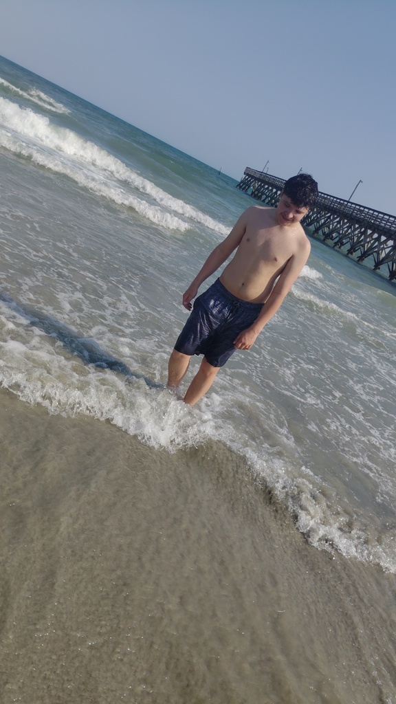 Jayden walking on the beach