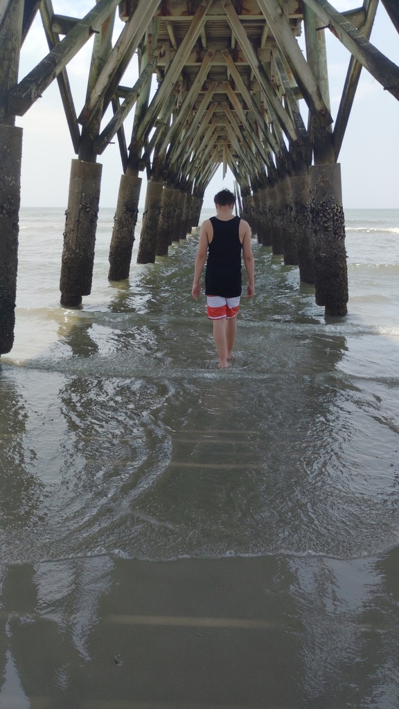 Jayden walking on the beach