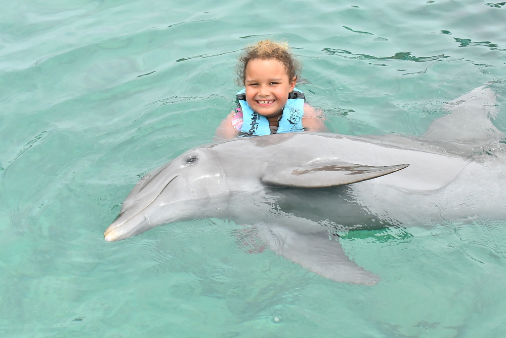 Rhylynn with a dolphin